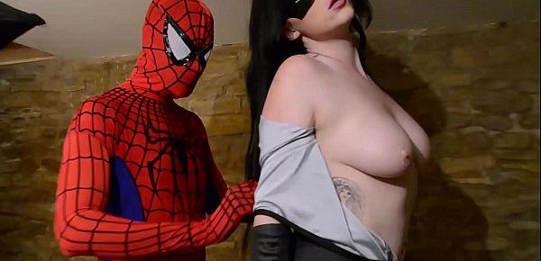  Catwoman takes spiderman´s web on her big tits